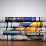 Blog Post Read the News Late by Rick Hamlin; Image of Newspapers; Photograph by Kai Stachowiak